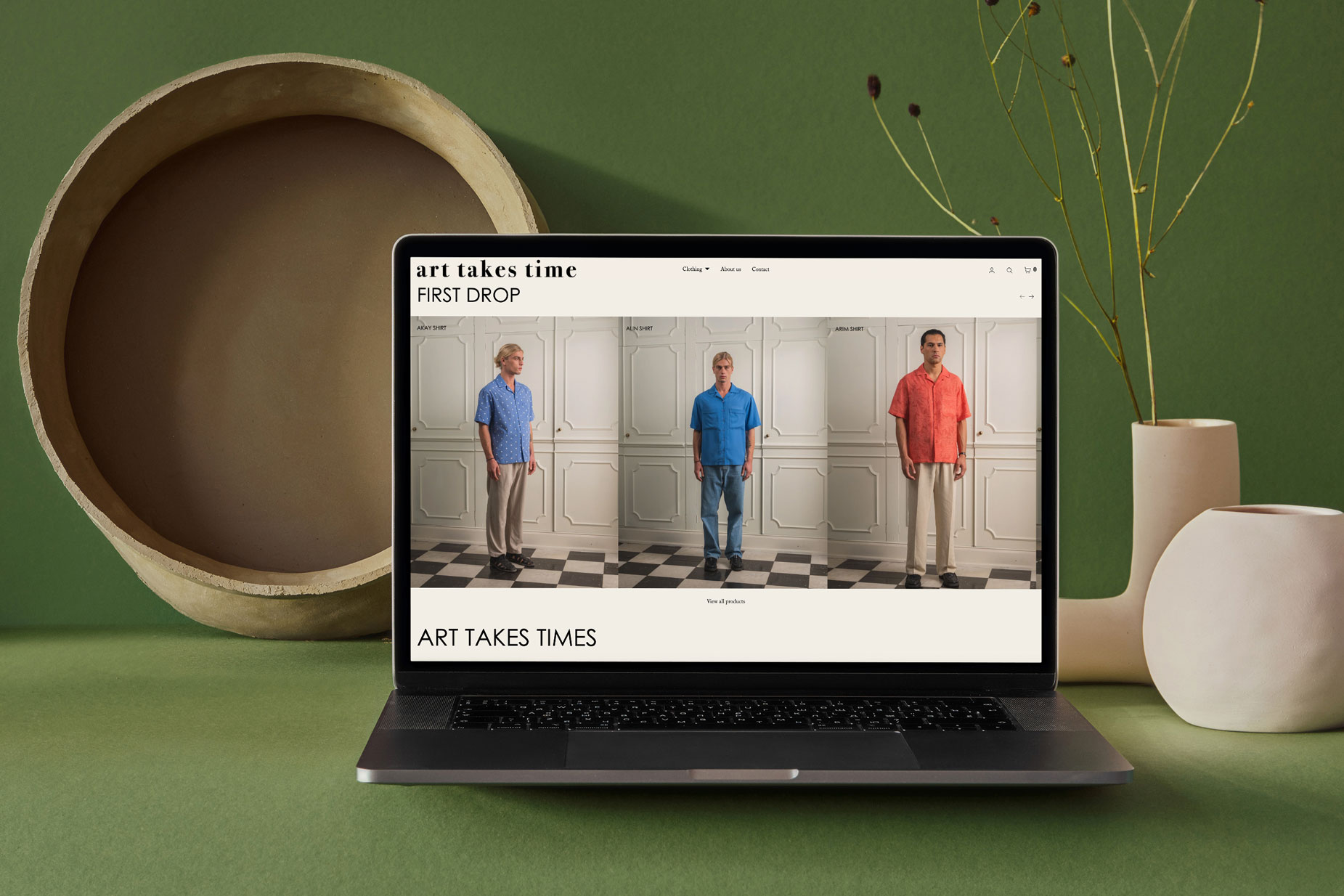 6723717308afe7cc796aa61d MacBook Pro with Vase Mockup